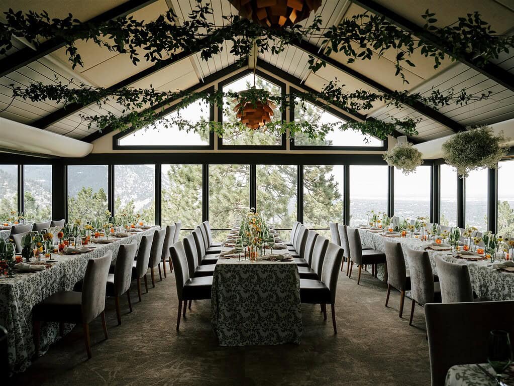 dining room at Flagstaff House on Flagstaff Mountain in Boulder Colorado decorated and covered in florals